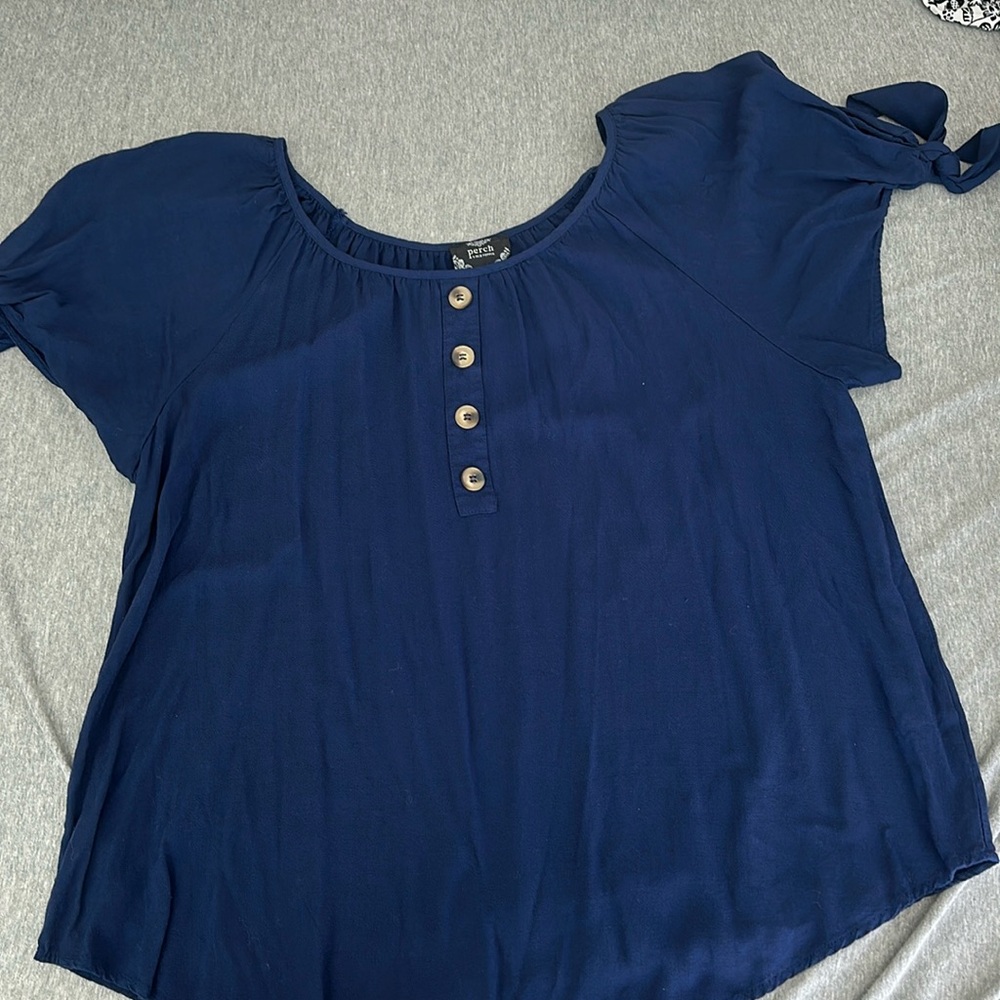 Navy blue top with bows on sleeves good condition